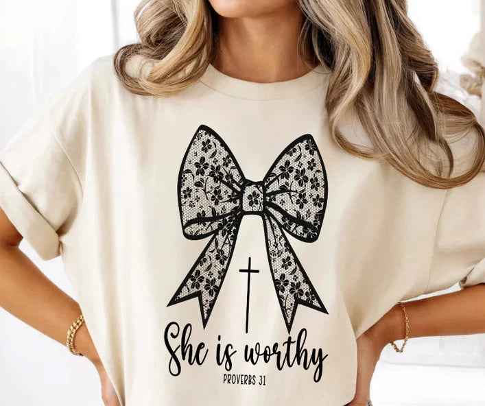 SHE IS WORTHY