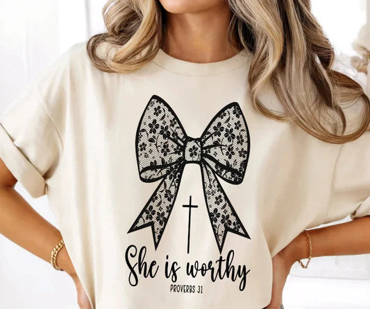 SHE IS WORTHY